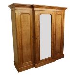 Good large Victorian birds eye maple breakfront triple robe, the central mirrored door enclosing