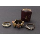 Interesting antique gilt metal ring inset with seven small oval cameo portraits, 28mm diameter;