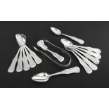 Set of twelve Dutch silver engraved teaspoons, with a matching pair of tongs and caddy spoon,