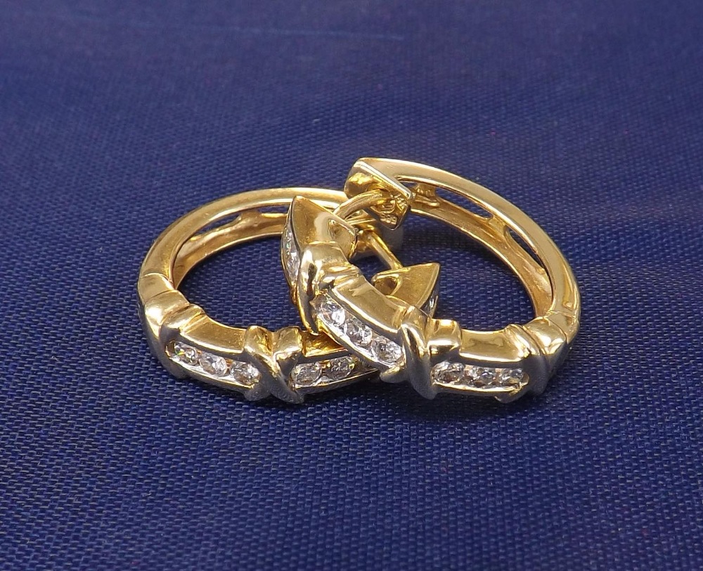 Pair of 14ct yellow gold diamond set earrings, 6.4gm, 21mm diameter