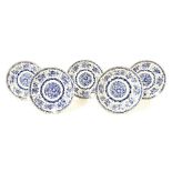 Set of five Chinese blue and white porcelain circular plates, each with foliate centres and