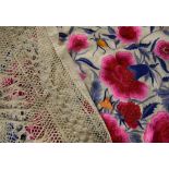 Attractive silk embroidered throw, worked with flowers principally in pink, with further blue,