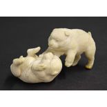 Japanese ivory okimono of two bear cubs play fighting, Meiji period, 2.25" high (at fault)