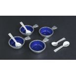 Set of four Georg Jensen silver and blue enamel salts, each with matching spoons, designed by