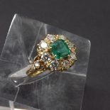 Attractive Victorian style 18ct emerald and diamond cluster ring, the emerald estimated 1.3ct approx