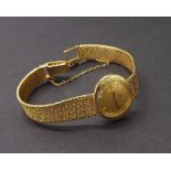 Omega 18ct lady's oval bracelet watch, circa 1967, gilt dial with baton markers, cal. 484