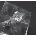 Aquamarine and diamond 18ct white gold three stone dress ring, the aquamarine estimated 2.25ct