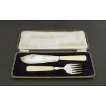 Pair of silver and ivory handled fish servers, with engraved foliate decoration, maker C.W