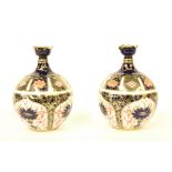 Pair of Royal Crown Derby Imari ovoid porcelain vases, pattern 1128, 4.75" high