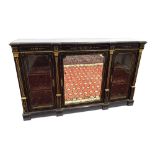 James Shoolbred & Co late Victorian ebonised side cabinet, with gilded scratch carving and applied