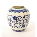 Chinese blue and white ovoid ginger jar, decorated with trails of flowers and foliage within waved