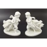 Pair of Moore & Co white glazed porcelain vases, modelled with cherubs pulling cornucopia shells