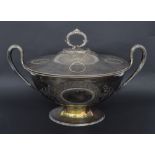 Large oval silver plated twin handled tureen and cover in the neo-classic style, with engraved and