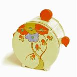 Clarice Cliff Bonjour biscuit barrel and cover painted with flowers in shades of red, yellow, blue