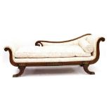 Regency rosewood brass inlaid chaise longue, the scroll back with later foliate upholstery, the