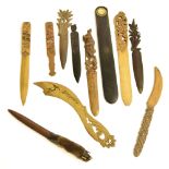 Paper knives/letter openers - decorative carved treen knives, the largest 12" long approx (11)