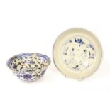 Chinese blue and white saucer dish freely painted with blue and white decoration, 7.25" diameter;