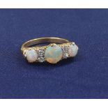 Attractive 18ct opal and diamond claw set dress ring, ring size O