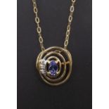 9ct yellow gold tanzanite and diamond oval necklet with integral pendant, the pendant 15mm x 13mm