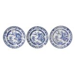 Set of three Chinese porcelain export blue and white plates, each decorated with traditional