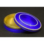 Continental blue and white guilloche enamel silver-gilt circular box and cover, import hallmarks for