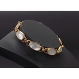 9ct mother of pearl and garnet set oval link bracelet, 20gm, 7.5" long