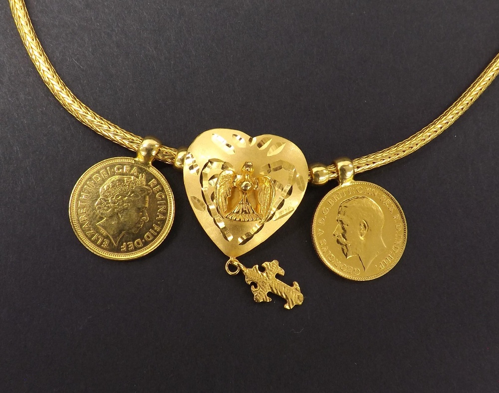 22ct necklet with two half sovereign pendants, 72.3gm