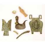 Various early Chinese metal artifacts; also a small terracotta figure and pottery cup (7)