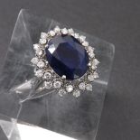 (133093-1-A) Impressive 14ct white gold and sapphire oval cluster ring, the sapphire estimated 8.3ct