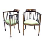 Pair of Edwardian mahogany inlaid tub bedroom chairs, with pierced lancet splats over green