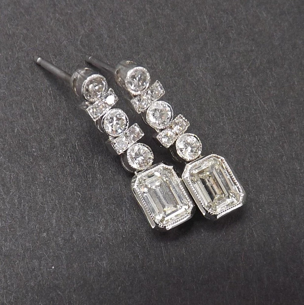 Pair of platinum and diamond set drop earrings, drop 20mm