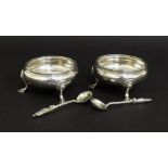 Pair of George III silver circular salts with hoof pad feet, maker John Muns, London 1769, 2.75"