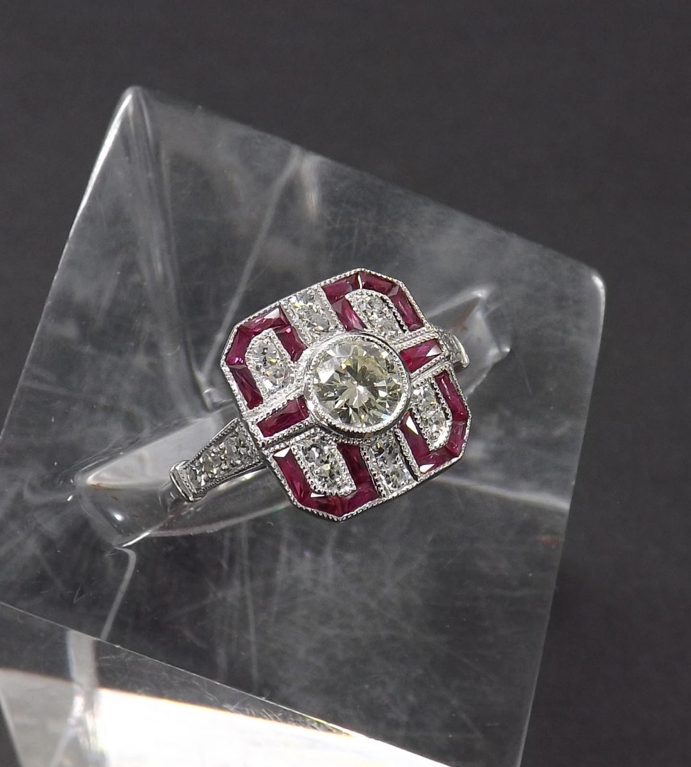 Attractive ruby and diamond 18ct white gold cluster ring in the Art Deco manner, 0.7ct approx,