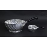 Munksgaard Danish silver wrythen fluted sauce pot with an ebonised handle, stamped maker's mark with