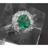 Large and impressive 18ct white gold emerald and diamond cluster ring, the emerald 2.40ct approx