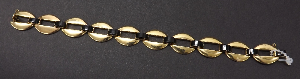 Mid 20th century 14ct bracelet, with fourteen pierced oval onyx joined links, 19.8gm, 8" long - Image 2 of 2