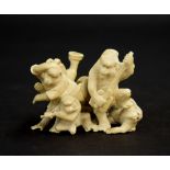 Japanese ivory okimono group modelled with seven monkeys playing musical instruments, Meiji