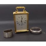 Silver napkin ring, silver engraved bangle; also a modern carriage clock (3)