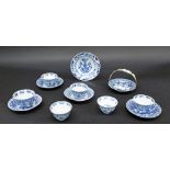 Set of six Chinese blue and white tea bowls and four saucers, with foliate designs, bearing reign