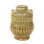 Mike Dodd (born 1943) - glazed stoneware ovoid twin handled vase with vertical fluted decoration,