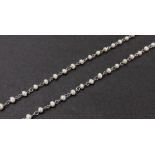 Attractive and delicate platinum seed pearl set necklace, 3.2gm, 17" long overall