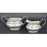 1920s oval boat shaped silver twin-handled sucrier and matching milk jug, maker Viner's Limited,