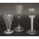 18th century wine glass, the bowl with flared rim over an air-twist stem upon a conical circular