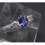 18ct white gold tanzanite and diamond three stone ring, the oval tanzanite estimated 1.8ct approx