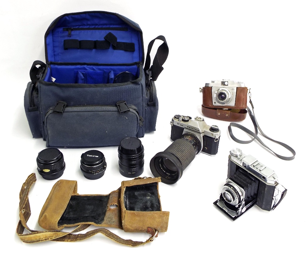 Pentax K1000 camera, in bag with assorted lenses; together with a Kodak