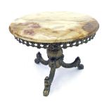 Decorative onyx and brass low circular occasional table, with a pierced frieze upon tripod scroll