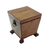 Regency flame mahogany wine cooler, the hinged lid enclosing a fitted interior with twin lion head
