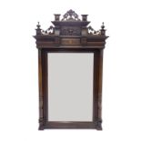 Large late 19th century French overmantel mirror, the frame surmounted by carved foliate and