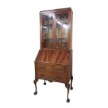 Georgian style mahogany bureau bookcase, with lancet astragal glazed doors over the fall front