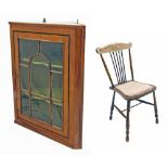 Hanging corner display cabinet with glazed door enclosing green baize lined walls and shelves, 39"